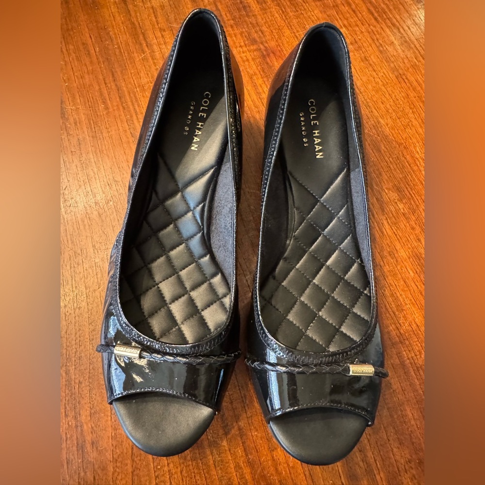 Black patent leather Cole Haan Grand OS peep-toe wedge shoes